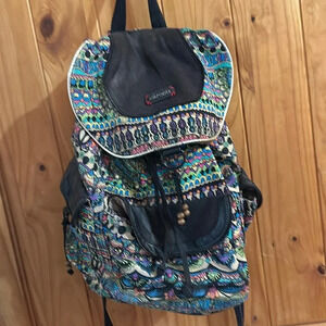 Sakroots multicolor flap backpack side pockets
